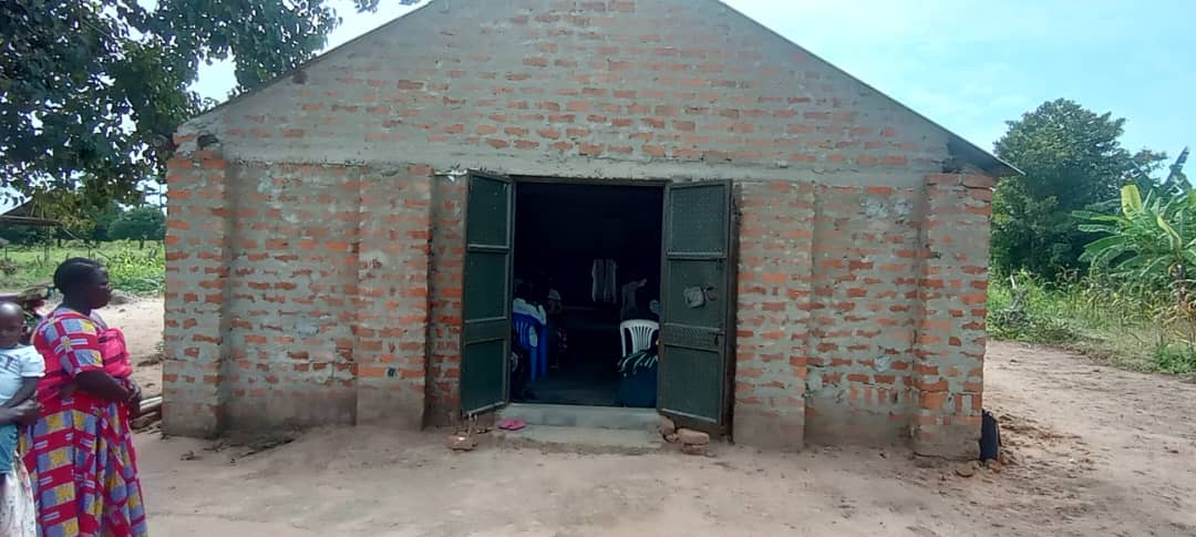 Brick community building with open doors