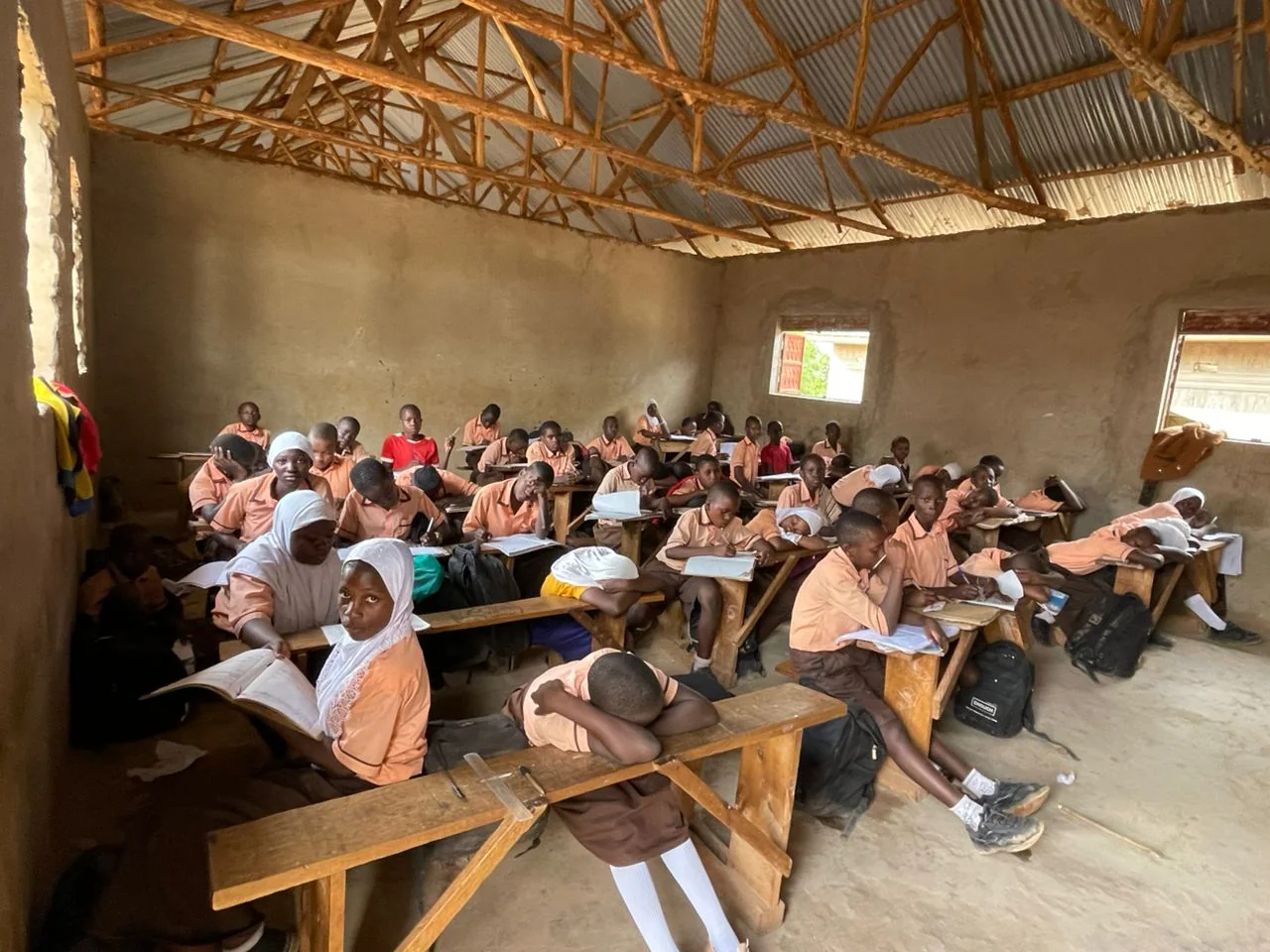 Children spending time in a school courtyard.